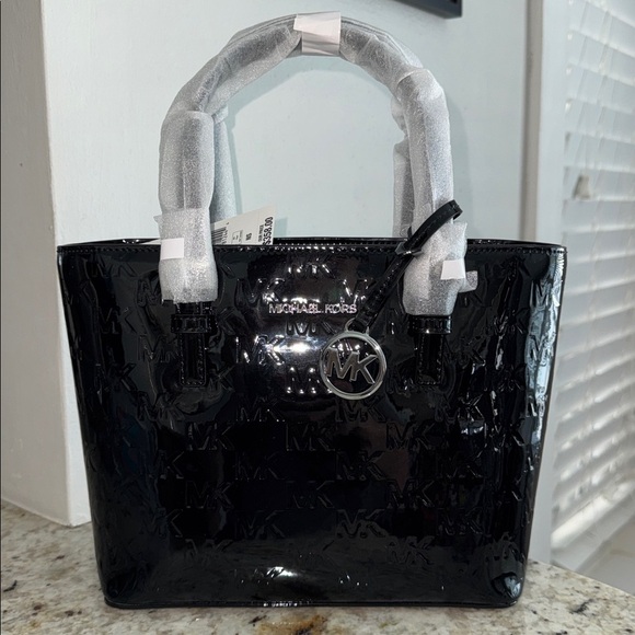 Michael Kors Handbags - Michael Kors Jet Set XS Black Patent Logo Debossed Convertible Crossbody Tote